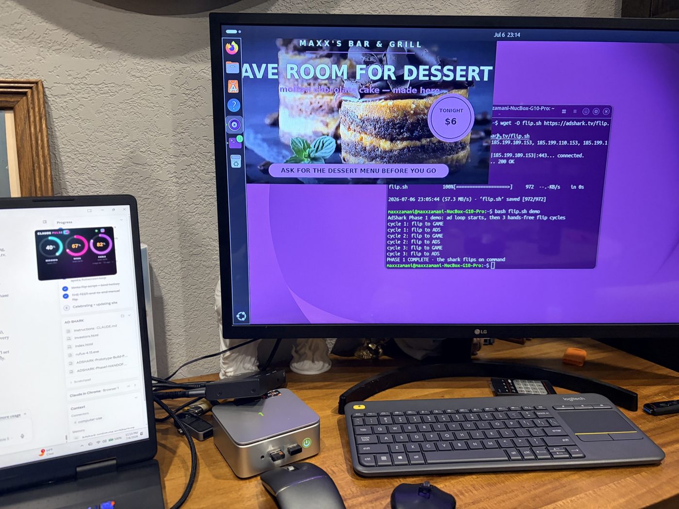 The AdShark bench prototype: a live house ad on the screen while the terminal reads Phase 1 complete — the shark flips on command
